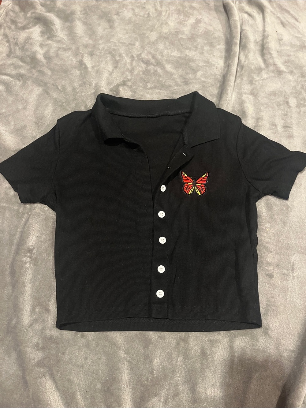 Black Cropped Polo Top with Embroidered Butterfly Accent